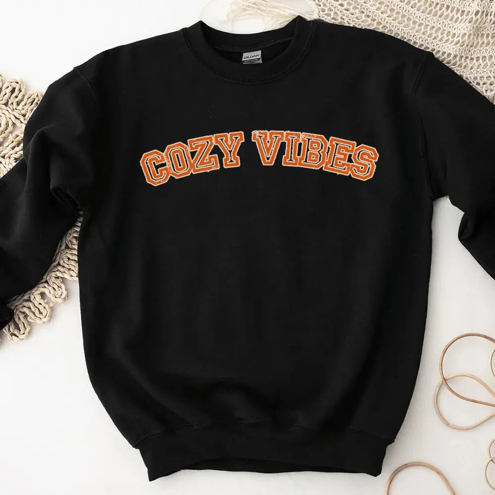 Cozy Vibes Fall Sweatshirt in a warm autumn color, showcasing its comfortable fit and stylish design, perfect for casual wear.