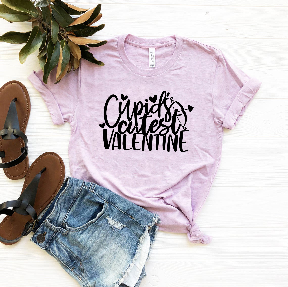 Cupid Cutest Valentine Shirt in various colors, showcasing its soft fabric and stylish design.