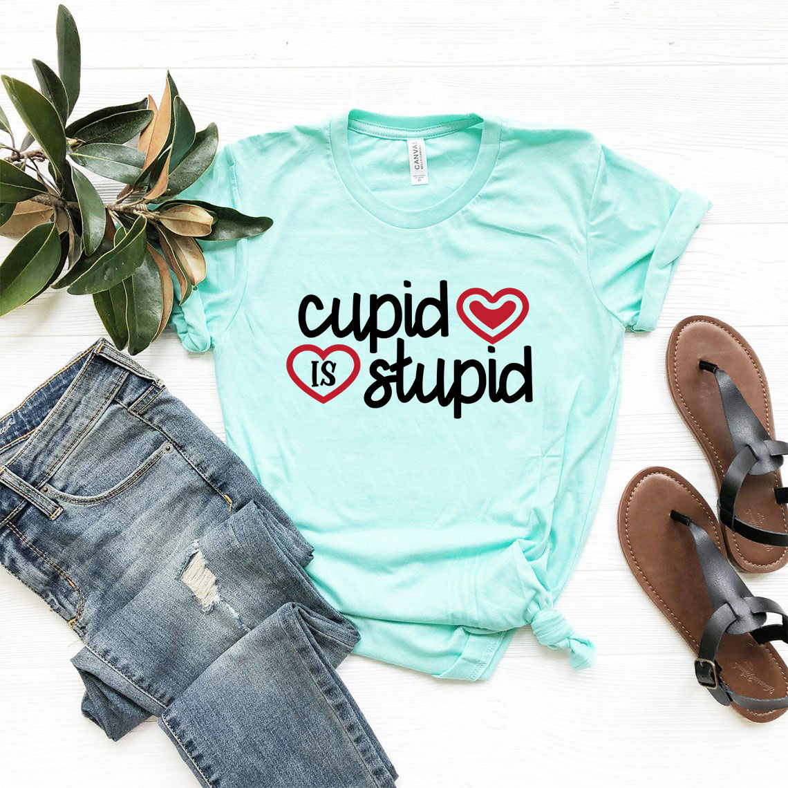 A stylish unisex Cupid Is Stupid Shirt in various colors, showcasing its comfortable fit and high-quality print.