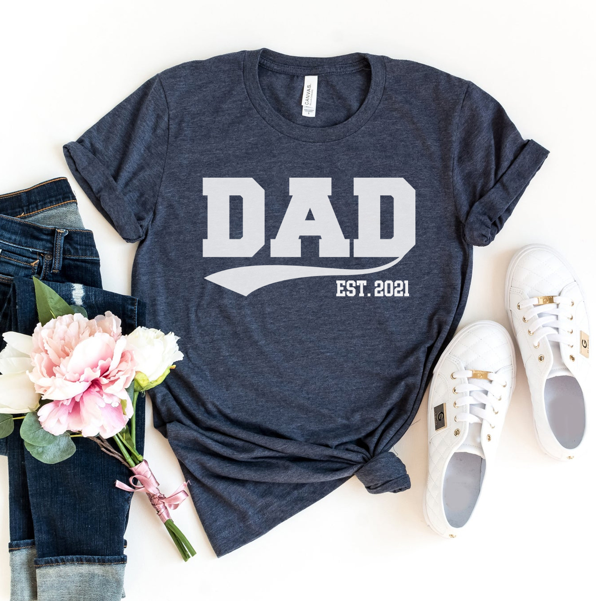 Dad Est 2021 T-shirt made of premium ring spun cotton with a stylish print, available in various sizes.