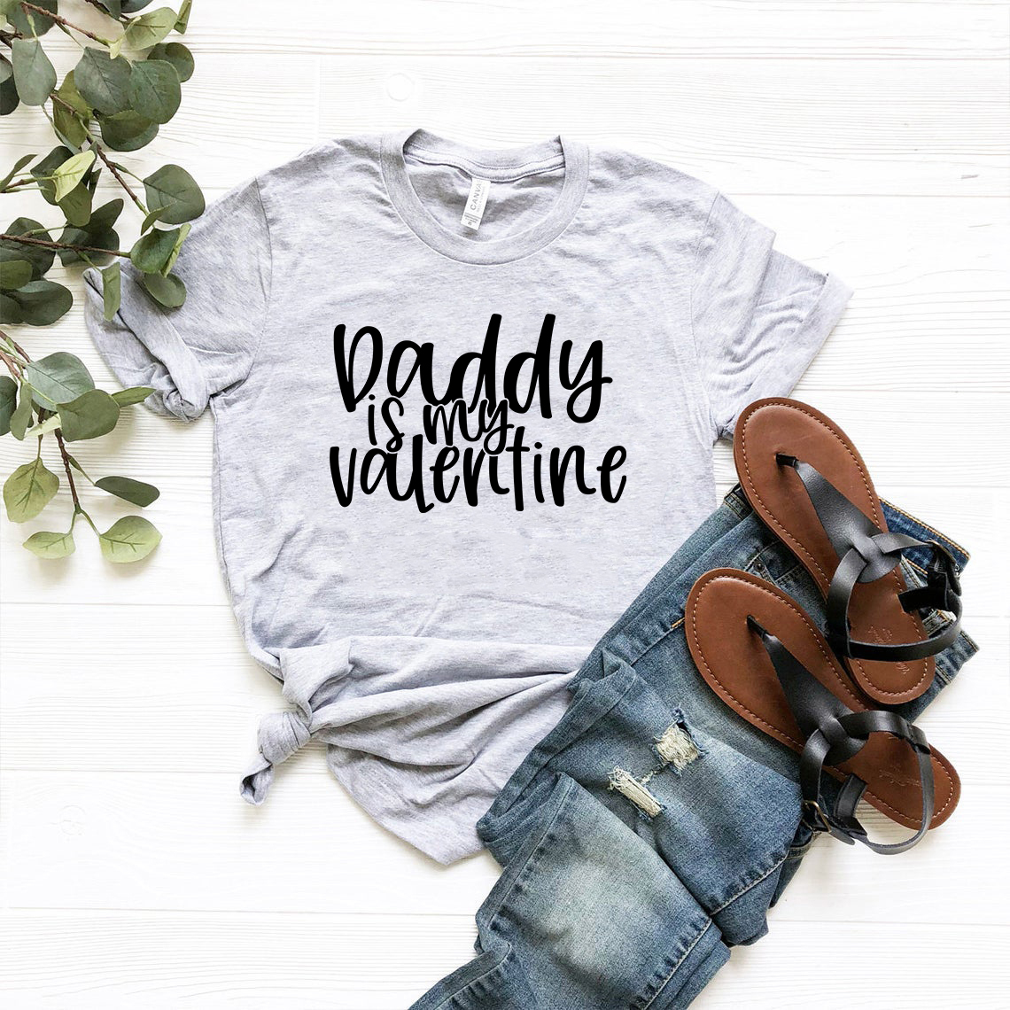 A unisex Daddy Is My Valentine Shirt in various colors, showcasing its soft fabric and stylish design.