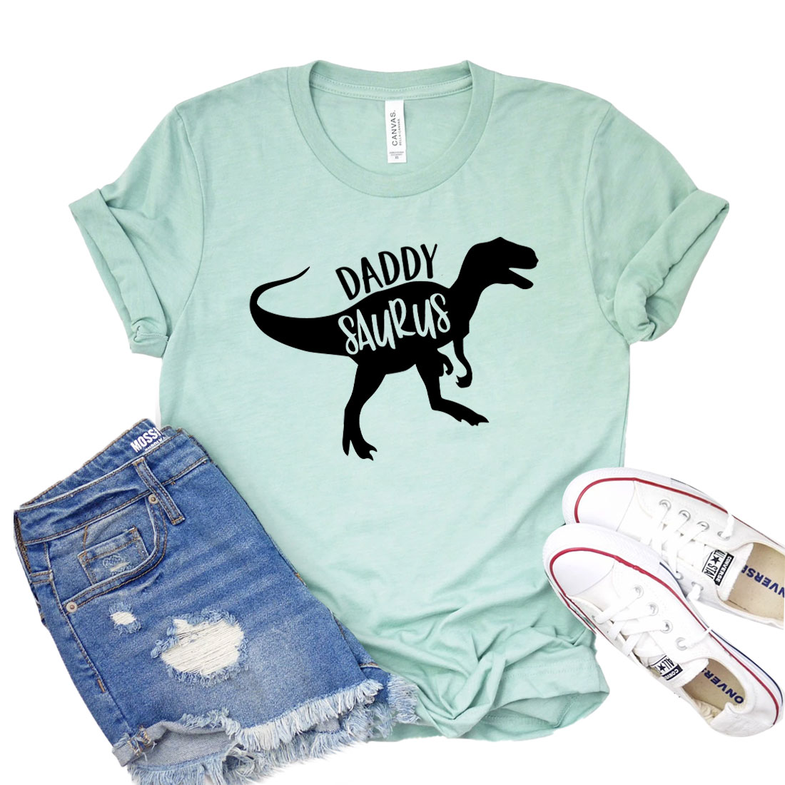 Daddy Saurus T-shirt featuring a fun dinosaur graphic on a classic unisex tee, made from soft cotton fabric.