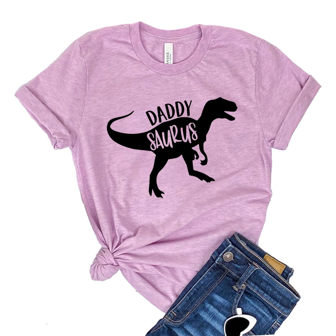 Daddy Saurus T-shirt featuring a fun dinosaur graphic on a classic unisex tee, made from soft cotton fabric.