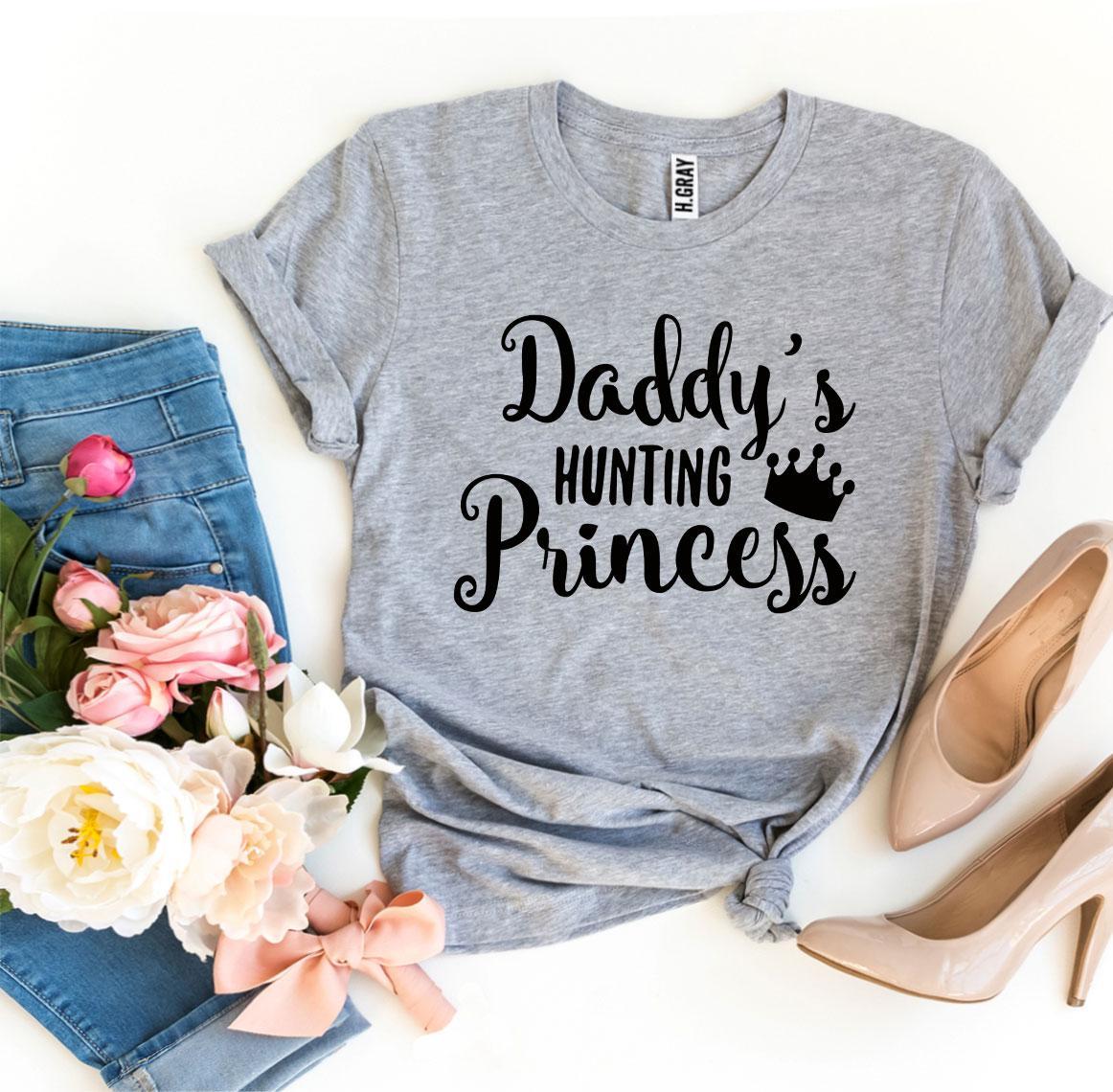 A stylish Daddy’s Hunting Princess T-shirt made from premium ring spun cotton, featuring a playful hunting princess design.