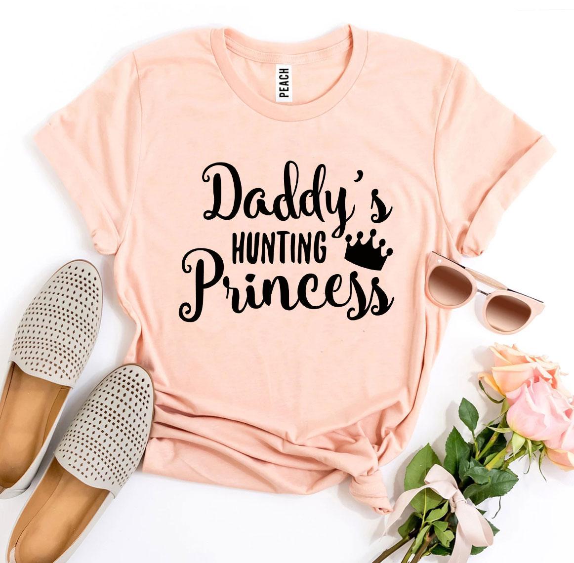 A stylish Daddy’s Hunting Princess T-shirt made from premium ring spun cotton, featuring a playful hunting princess design.