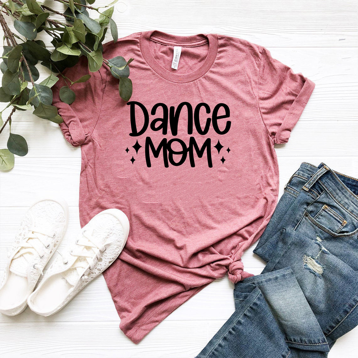 A stylish unisex Dance Mom Shirt made from soft ring spun cotton, available in multiple colors and sizes.