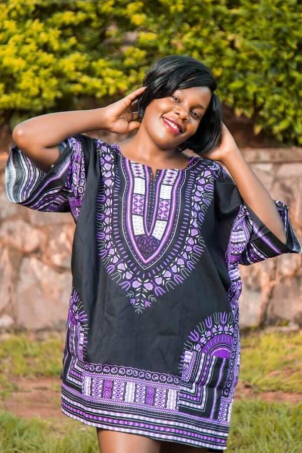 Dashiki African Festival Black Shirt featuring vibrant handmade print in black, yellow, and orange colors, made from 100% cotton.