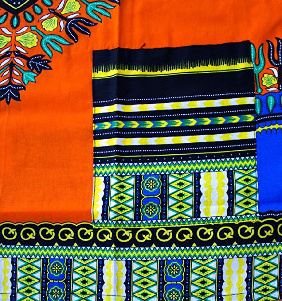 Vibrant orange Dashiki African Shirt made from 100% cotton, showcasing unique front and back design.