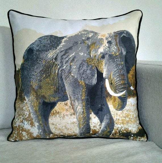 Decorative throw cushion pillow cover featuring an elephant design, showcasing African art with vibrant colors and intricate patterns.