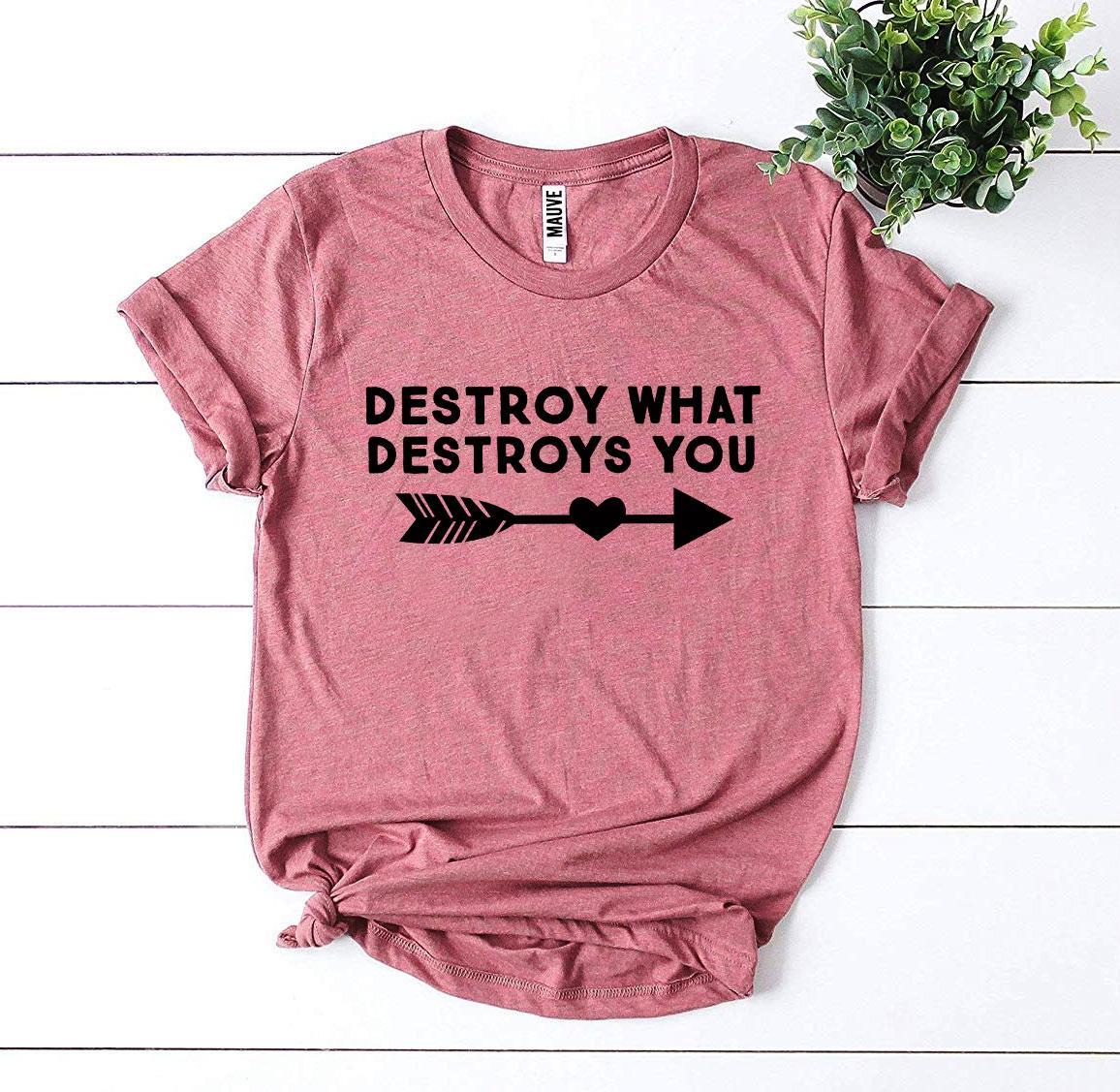 Destroy What Destroys You T-shirt made of premium ring spun cotton with a striking design and soft textile flex print.