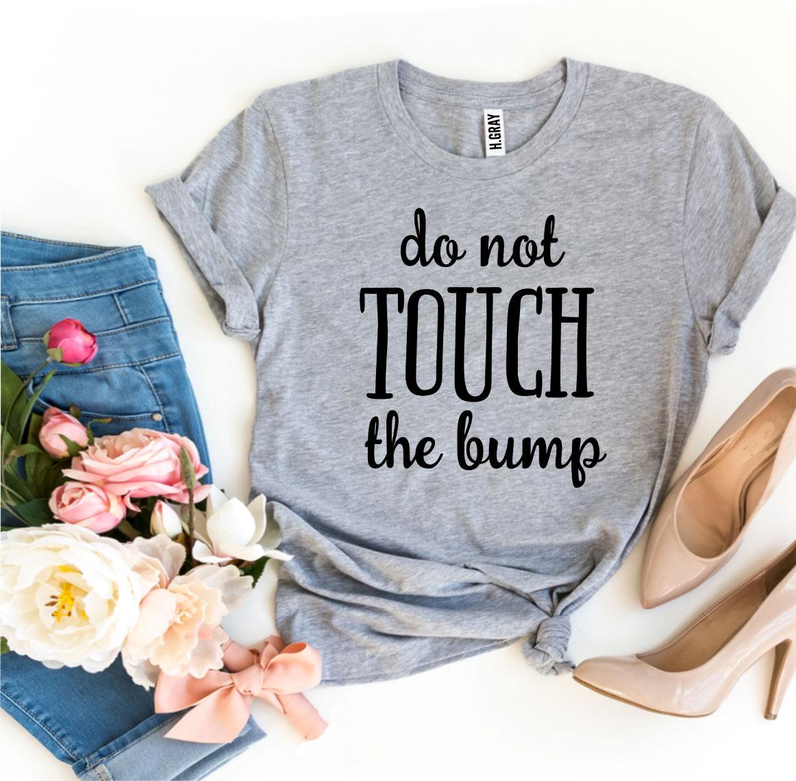 Do Not Touch The Bump T-shirt made from premium ring spun cotton, featuring a soft textile flex print design.