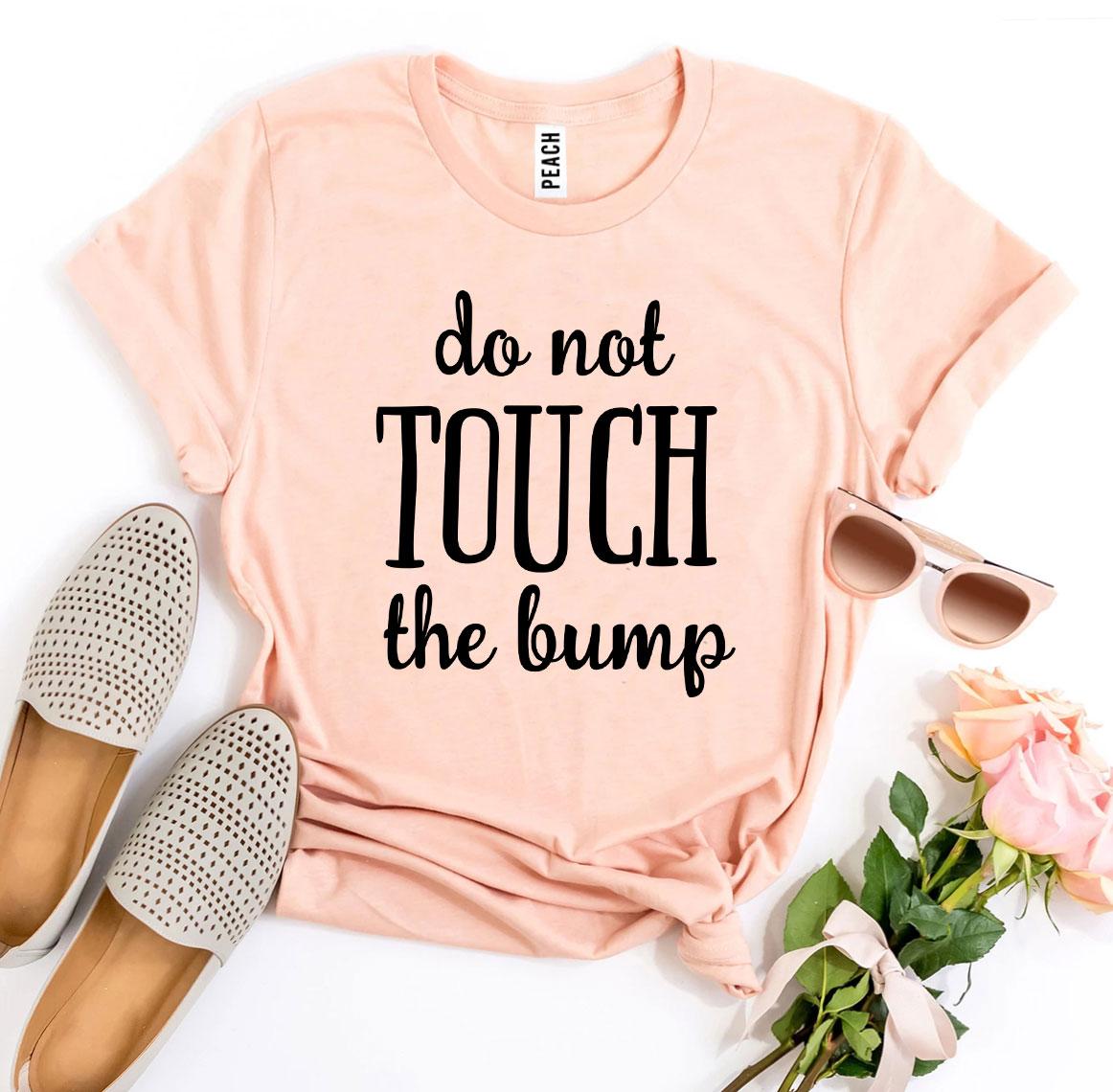 Do Not Touch The Bump T-shirt made from premium ring spun cotton, featuring a soft textile flex print design.