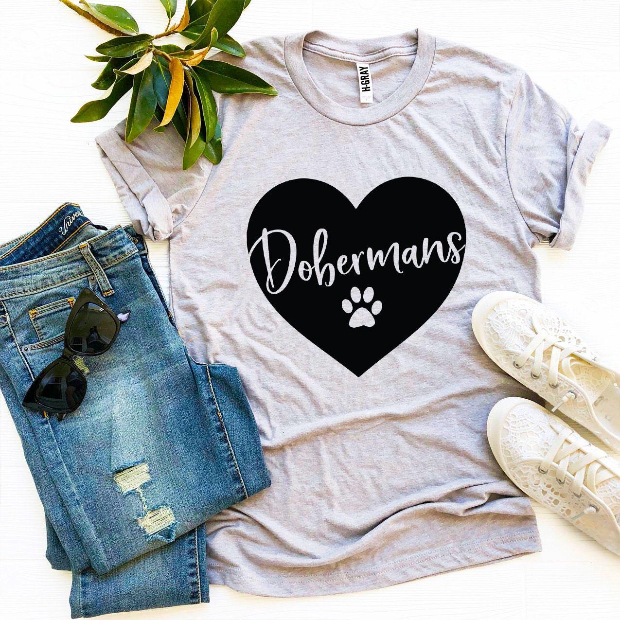 A stylish Dobermans T-shirt made from premium ring spun cotton, featuring a vibrant flex print design.