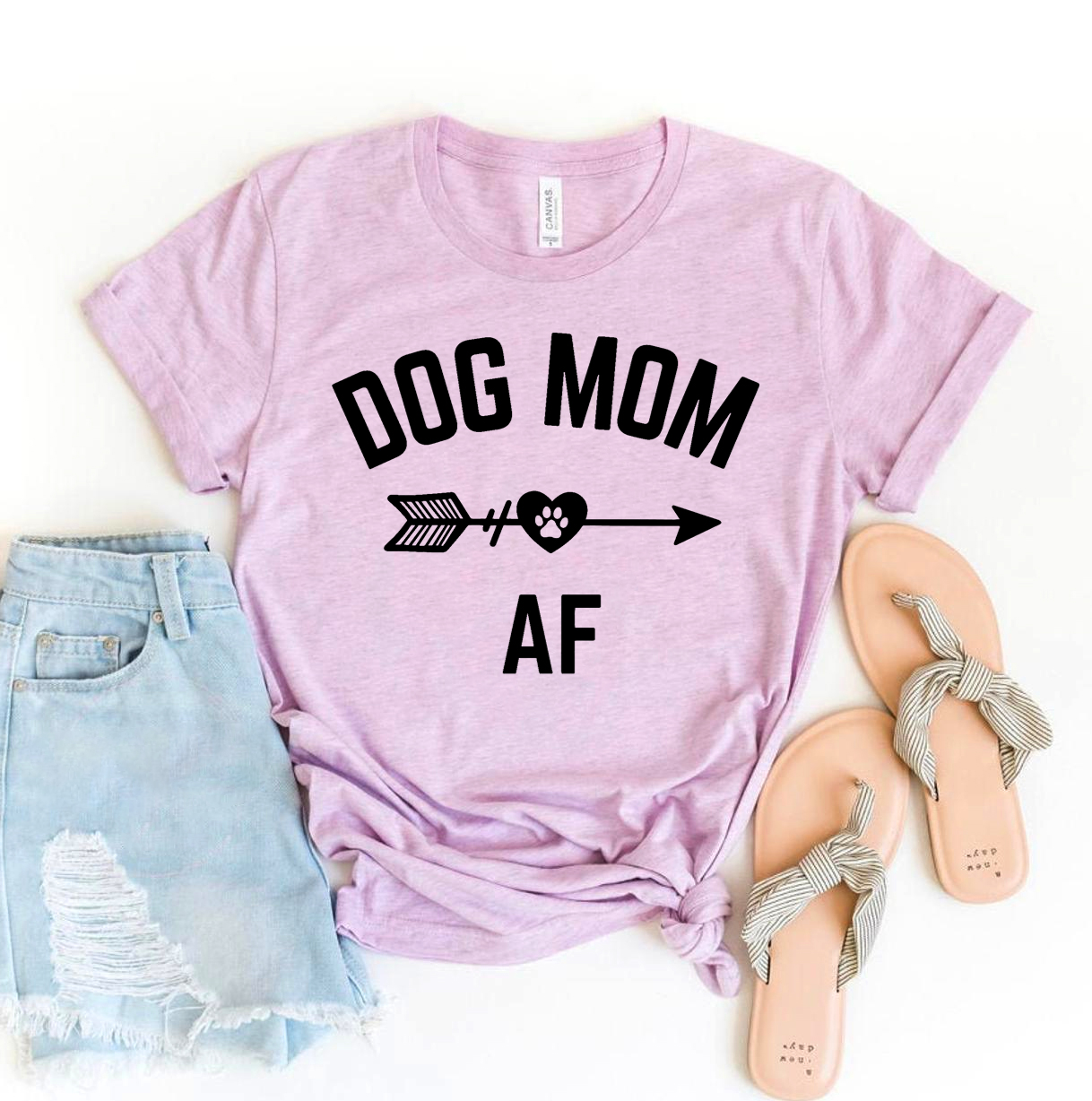 Dog Mom AF T-shirt made of premium ring spun cotton, featuring a stylish design and comfortable fit, available in various sizes.