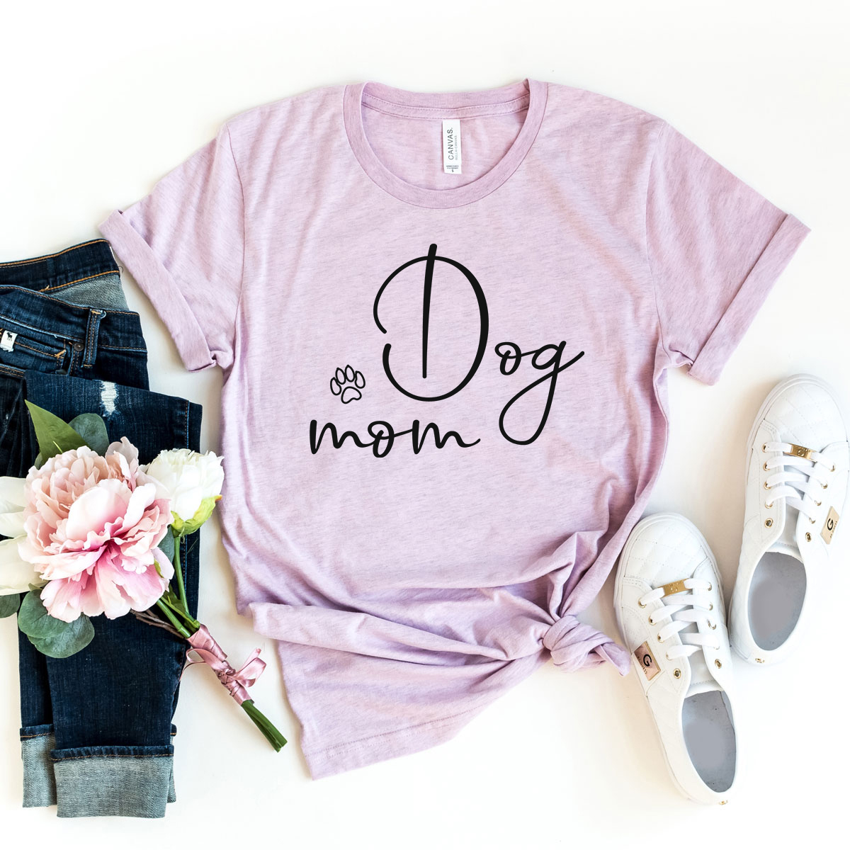 A stylish unisex Dog Mom Shirt made from soft ring spun cotton, featuring a crew neck and short sleeves, available in multiple colors.