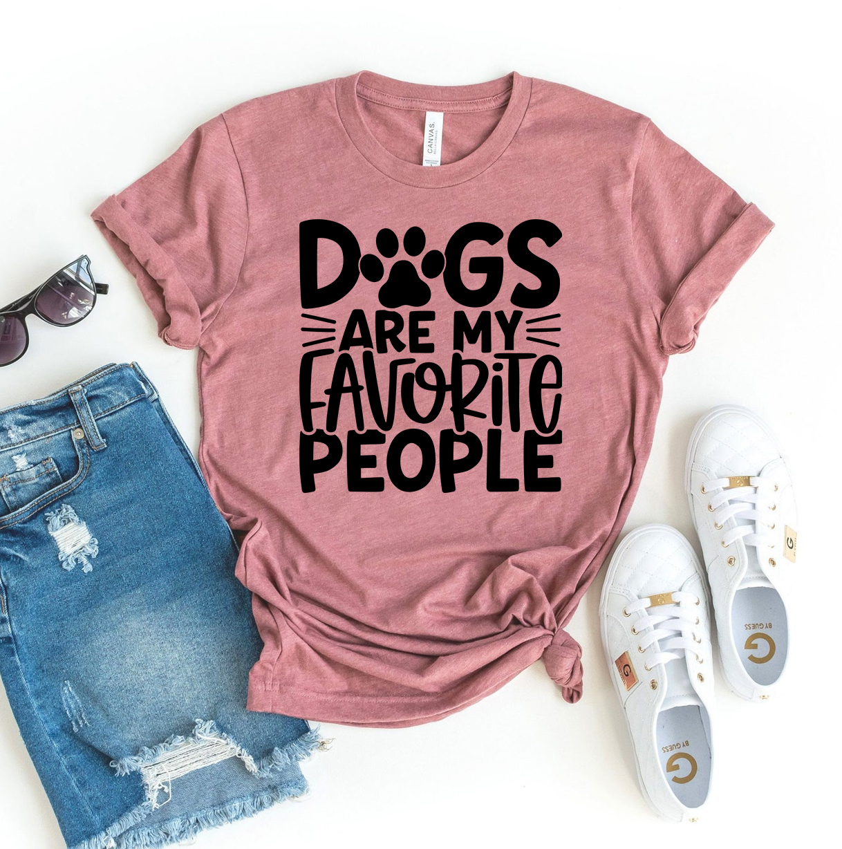 A comfortable and stylish T-shirt featuring the phrase 'Dogs Are My Favorite People', made from premium ring spun cotton.