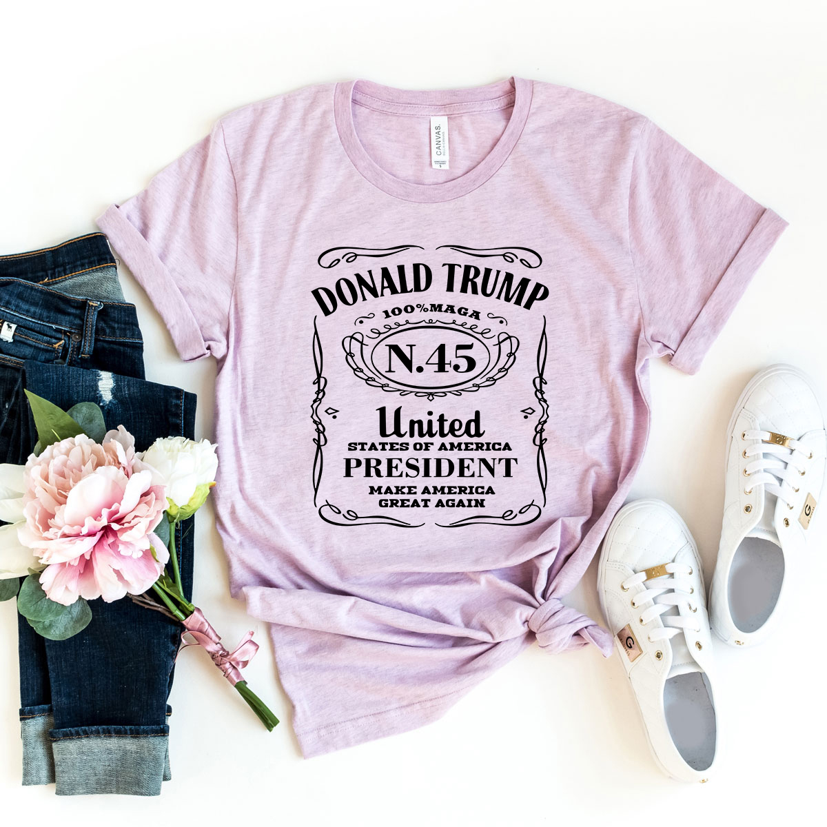 A stylish unisex Donald Trump shirt made from soft ring spun cotton, featuring a crew neck and short sleeves, available in multiple colors.