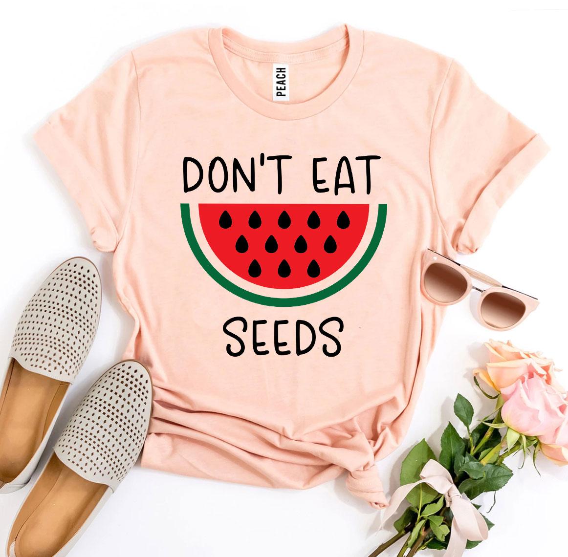 Don’t Eat Watermelon Seeds T-shirt made of soft ring spun cotton with a playful design, available in various sizes.