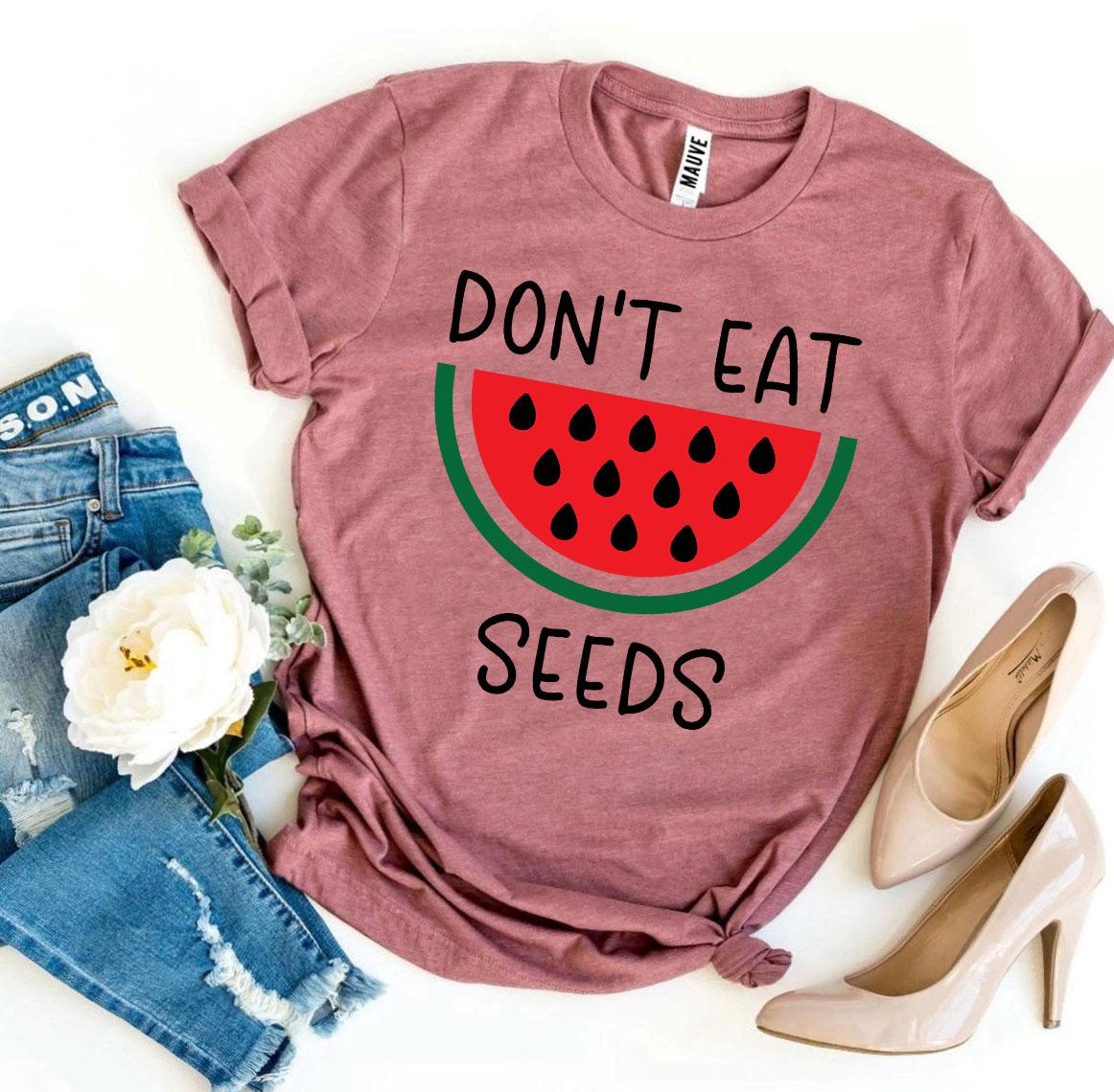 Don’t Eat Watermelon Seeds T-shirt made of soft ring spun cotton with a playful design, available in various sizes.