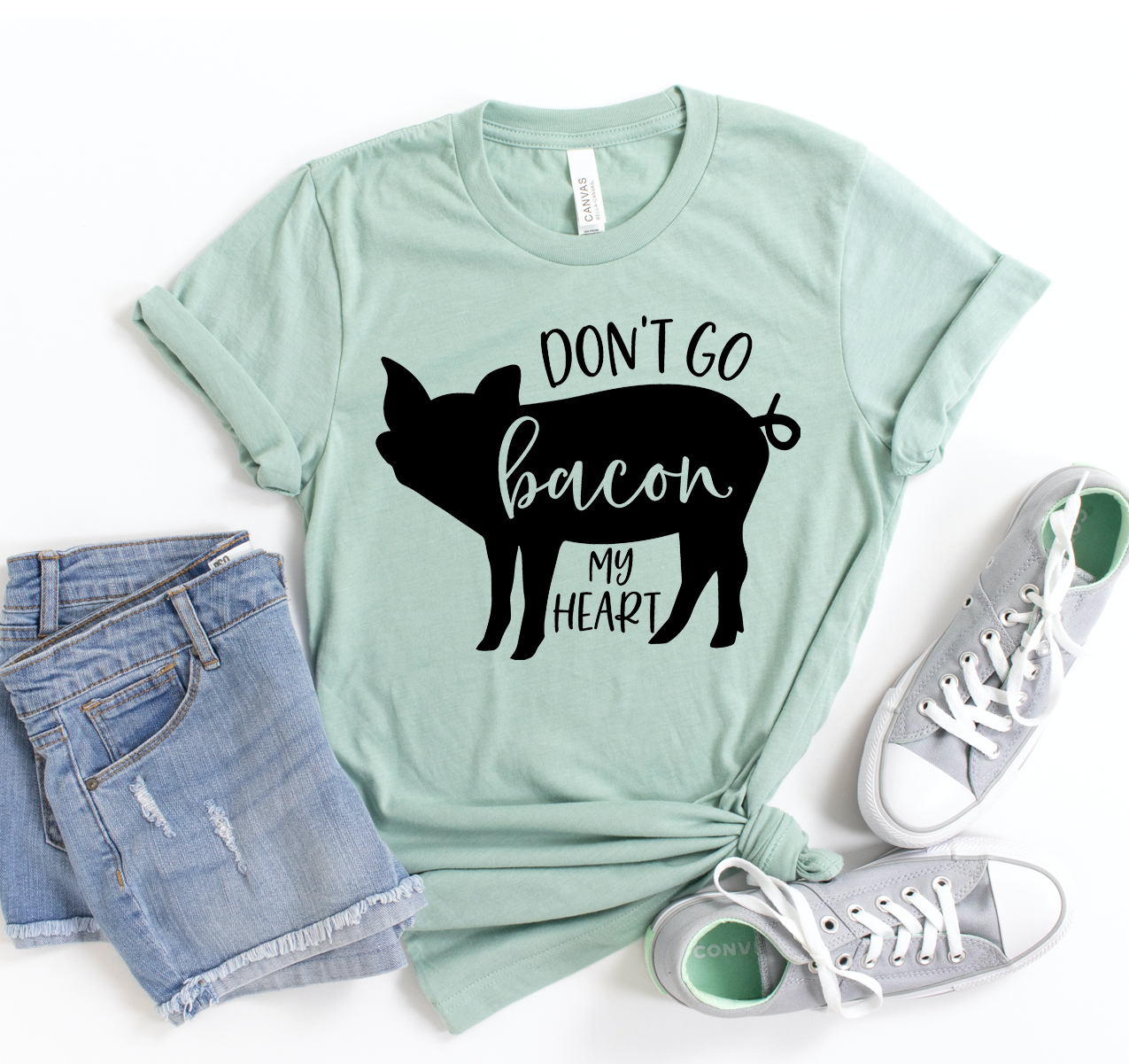 A stylish unisex Dont Go Bacon My Heart T-shirt featuring a humorous bacon-themed design, made from soft airlume cotton.