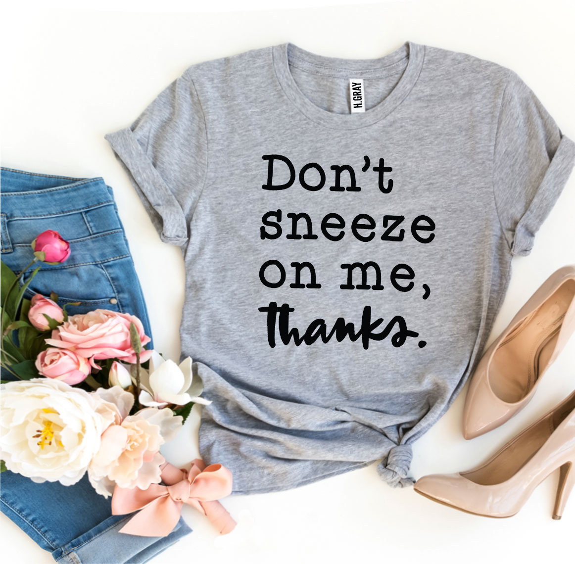 Don't Sneeze On Me T-shirt made from premium ring spun cotton with a striking design and soft textile flex print.