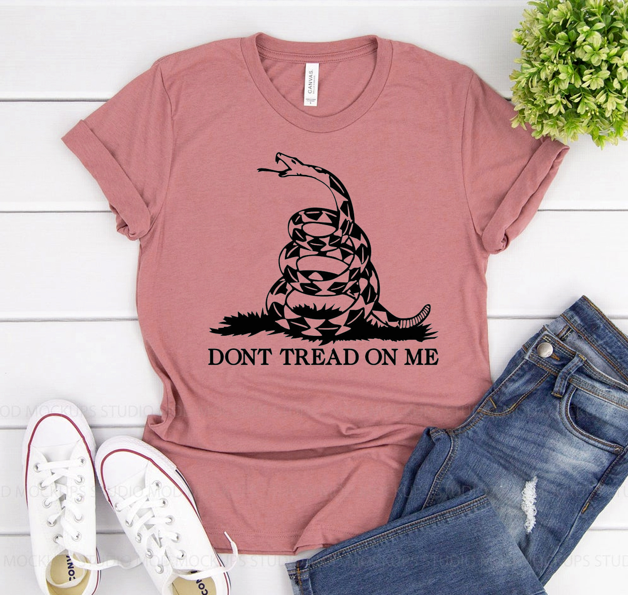 A classic unisex Dont Tread On Me T-shirt made from 100% cotton, featuring a bold design and available in various sizes.