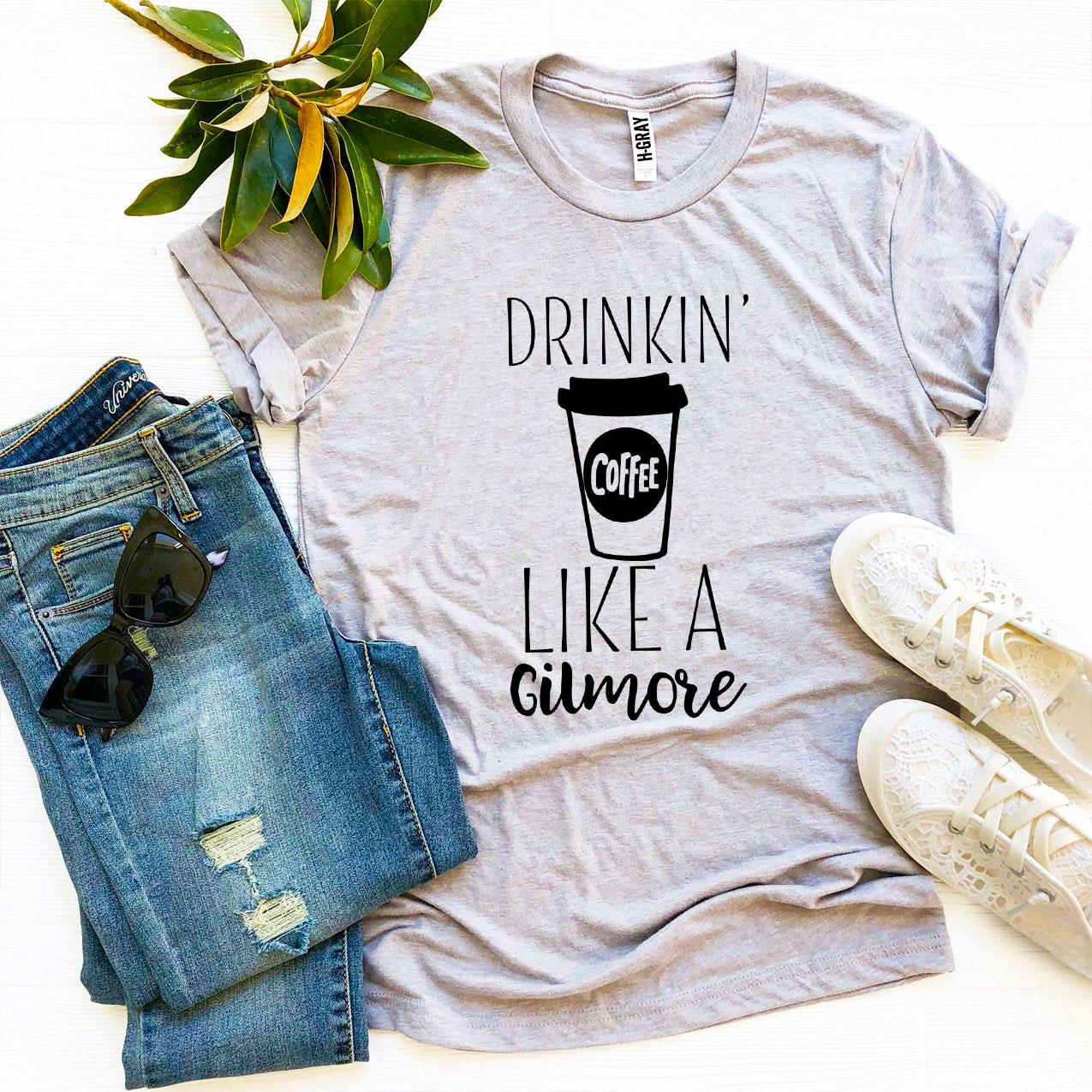 Drinkin’ Coffee Like a Gilmore T-shirt made of premium ring spun cotton with a stylish coffee-themed design.