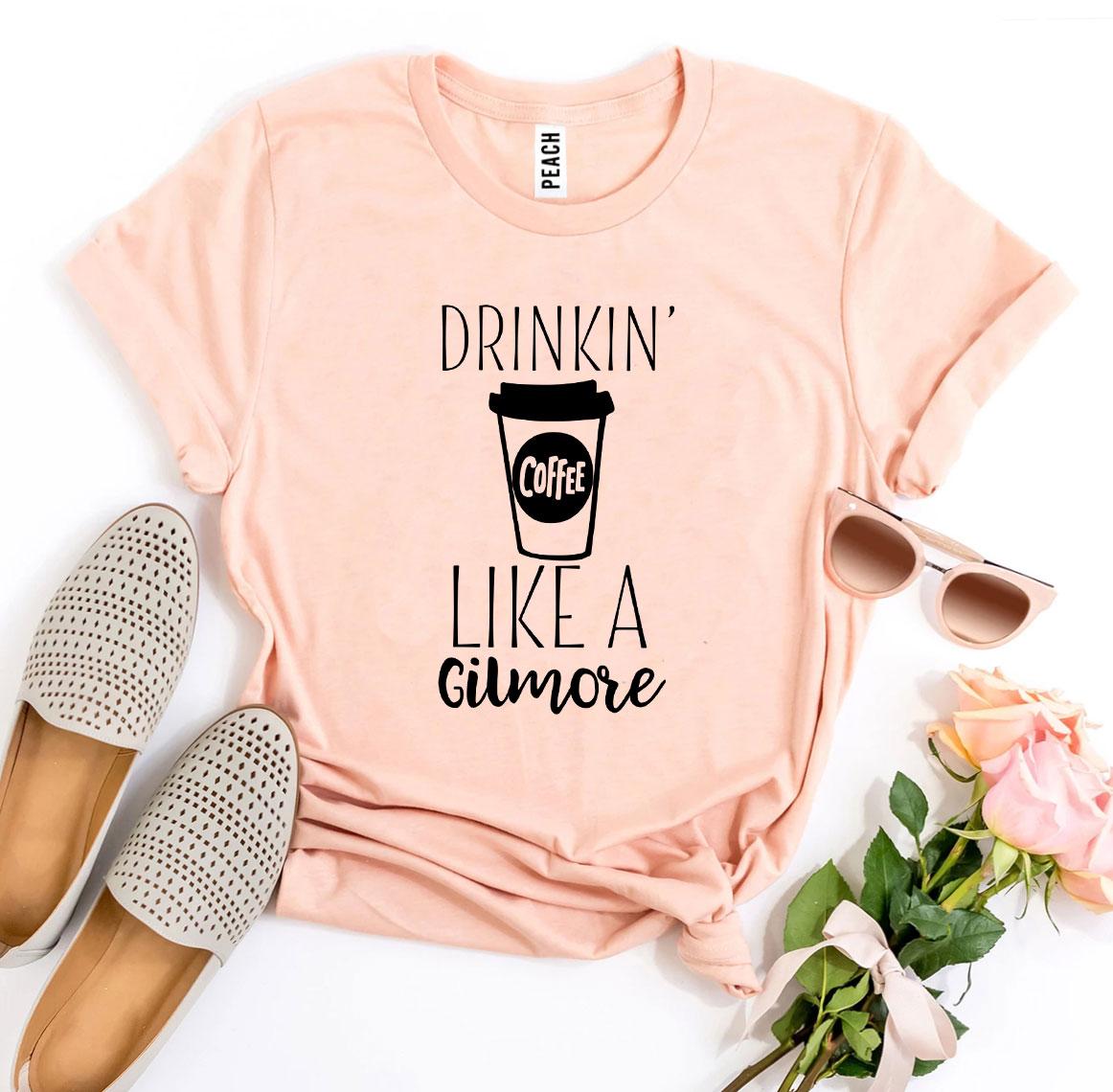 Drinkin’ Coffee Like a Gilmore T-shirt made of premium ring spun cotton with a stylish coffee-themed design.