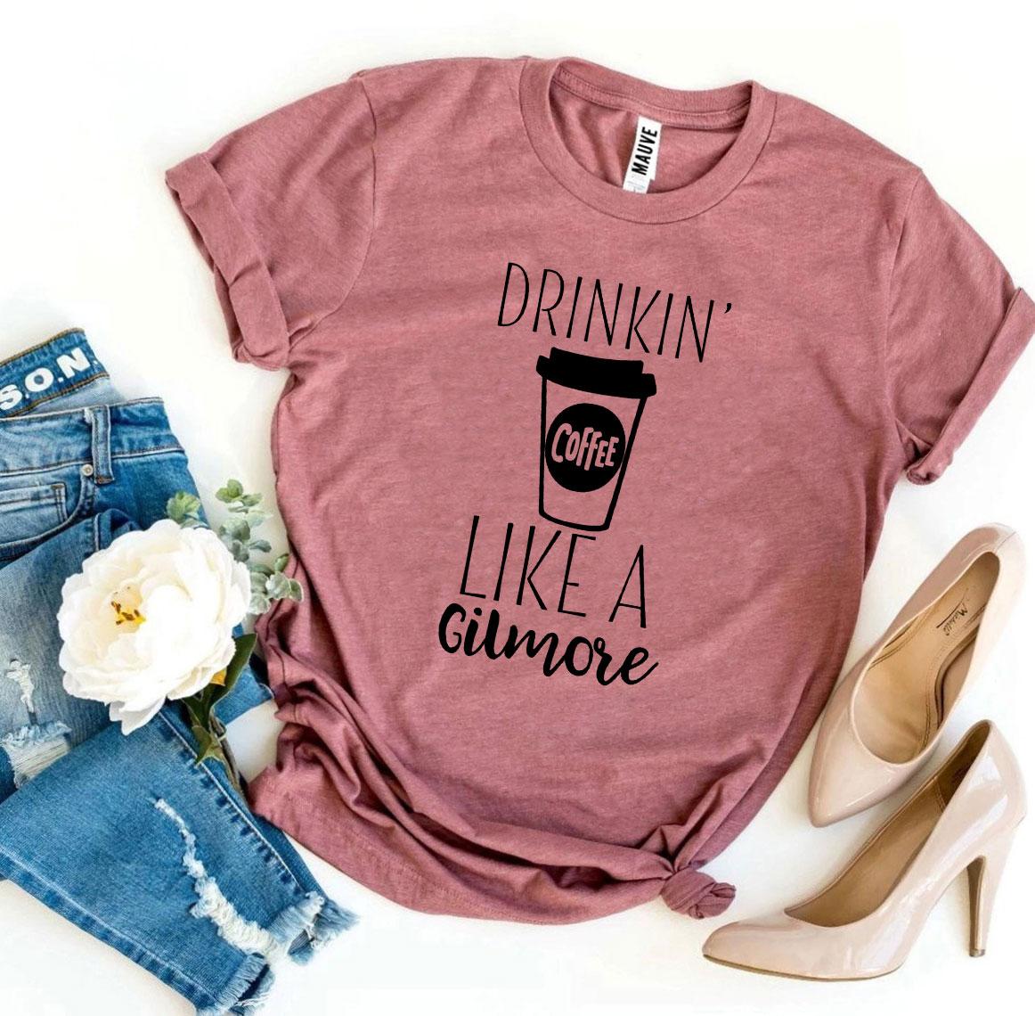 Drinkin’ Coffee Like a Gilmore T-shirt made of premium ring spun cotton with a stylish coffee-themed design.