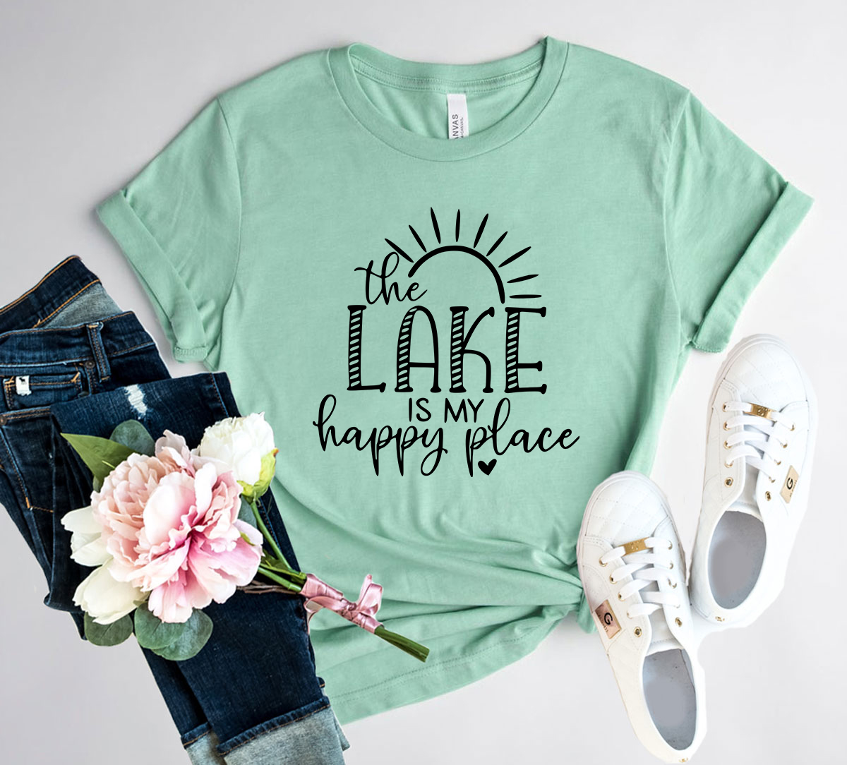 DT0168 The Lake Is My Happy Place Shirt in various colors, showcasing its soft fabric and stylish design.