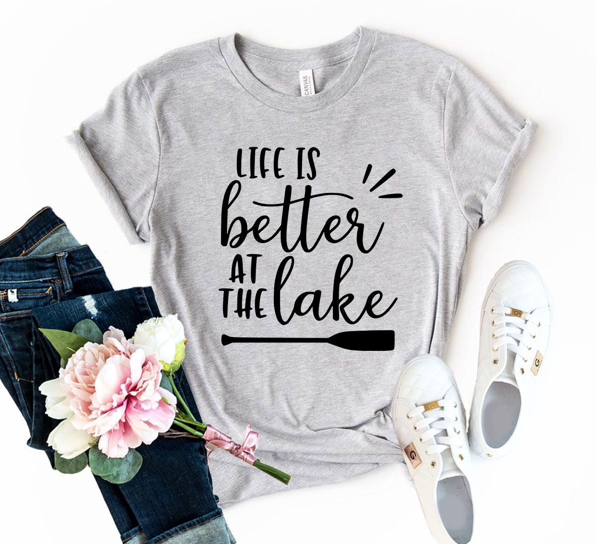 DT0118 Life Is Better At The Lakes Shirt in various colors, showcasing its unisex design and soft fabric.