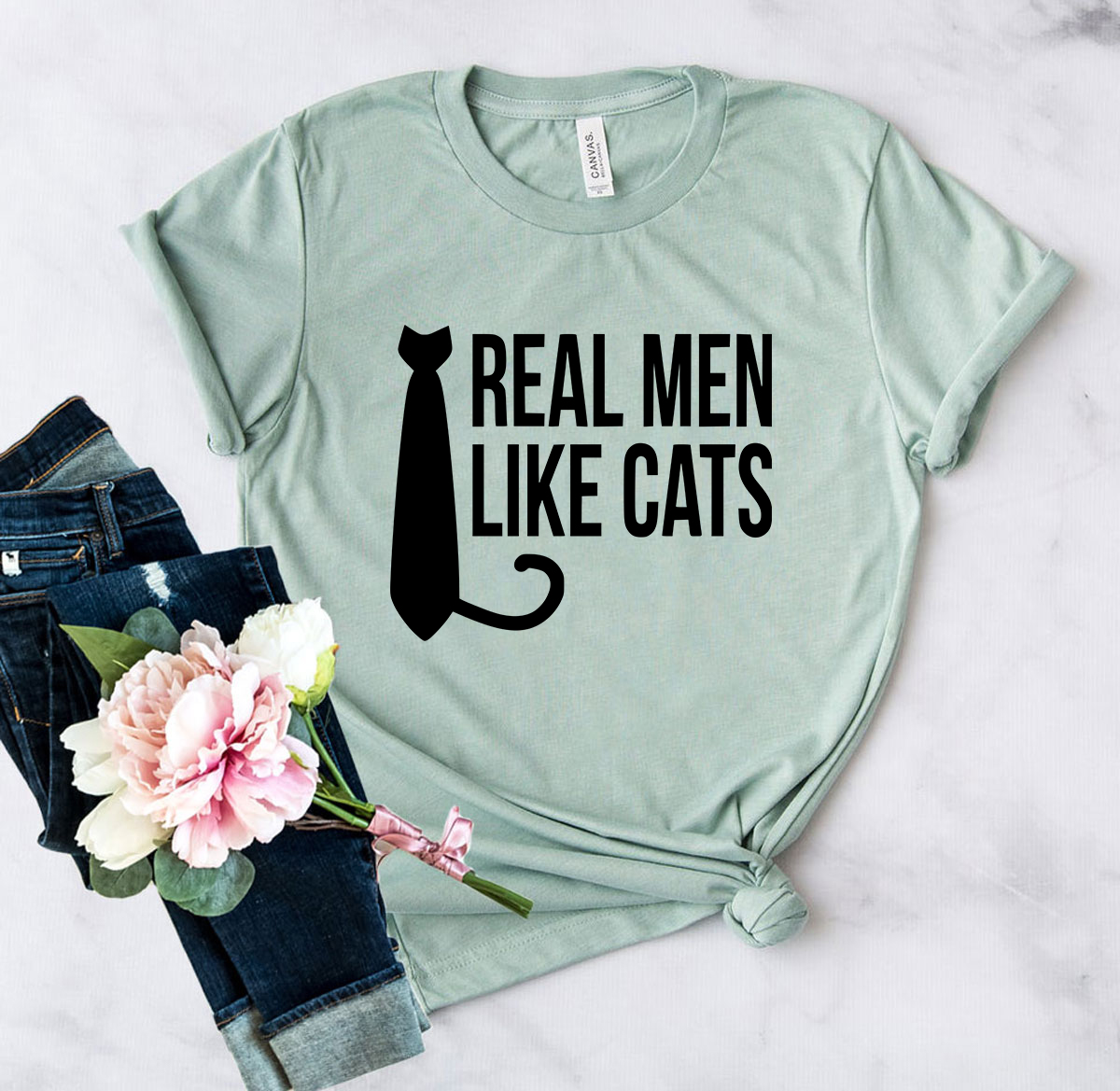 DT0180 Real Man Like Cat Shirt in various colors, showcasing its soft fabric and stylish design.