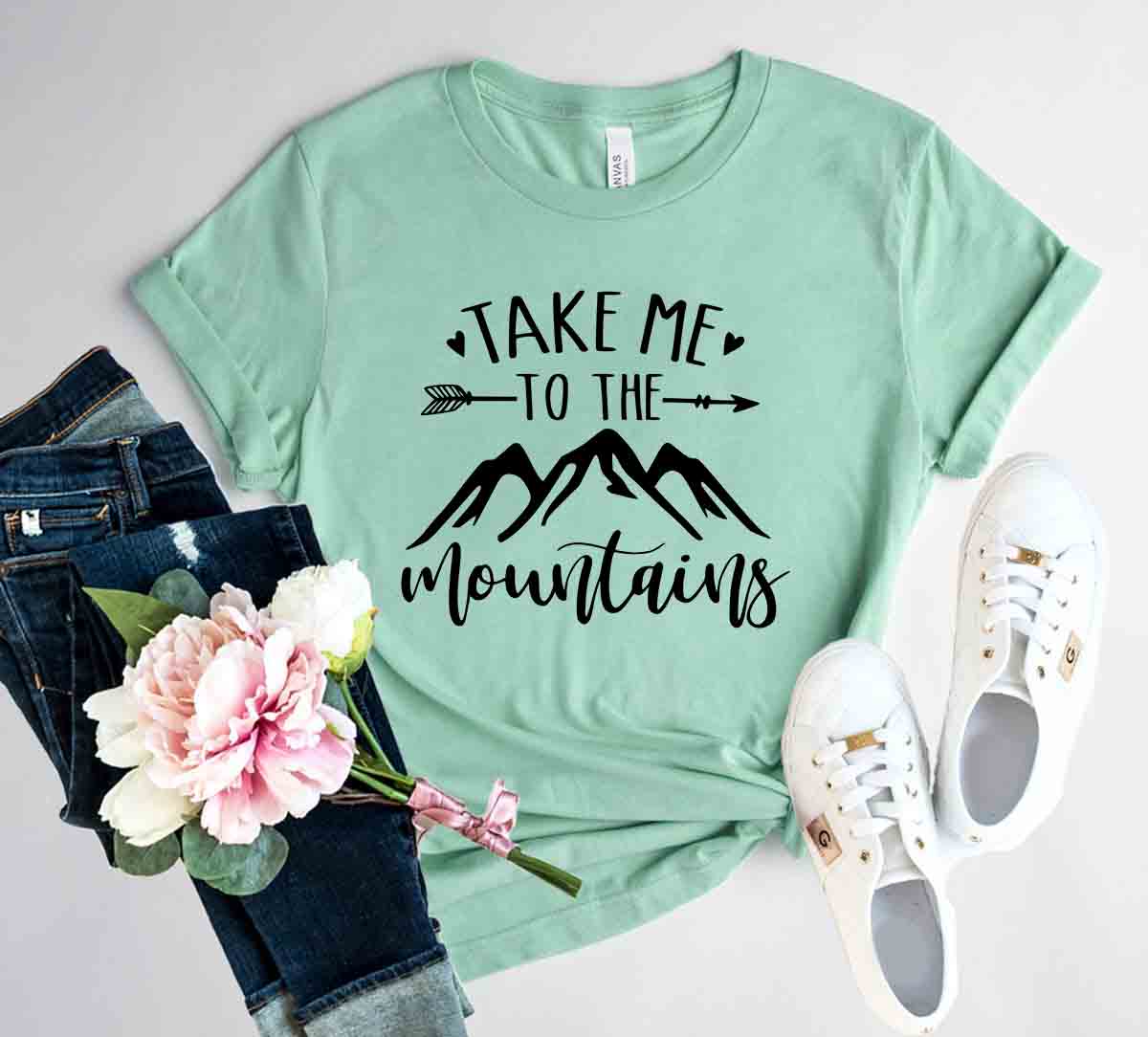 DT0226 Take Me To The Mountains Shirt in various colors, showcasing its soft fabric and stylish design.