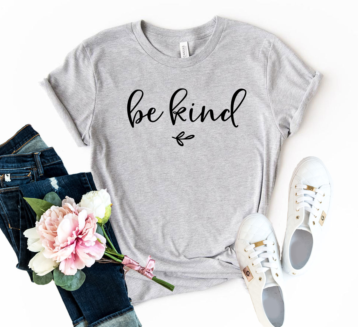 DT0038 Be Kind Shirt in various colors, showcasing its comfortable fabric and stylish design.