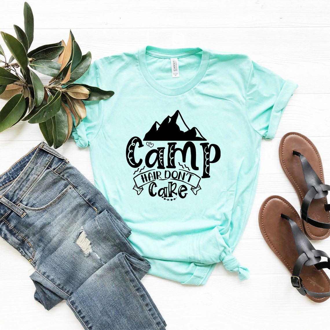 DT0582 Camp Hair Don't Care unisex T-shirt in various colors, showcasing its soft fabric and stylish design.