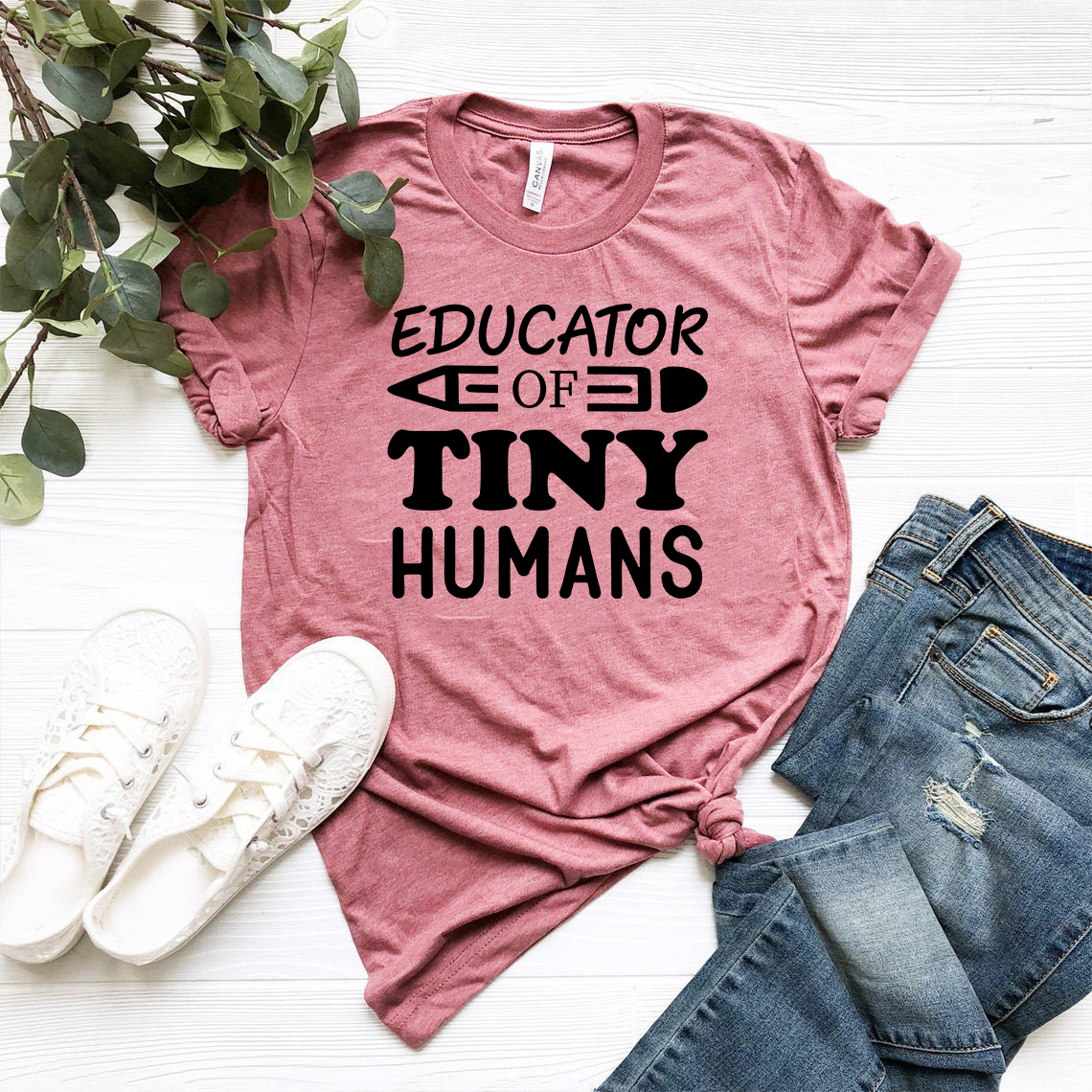 DT0616 Educator of Tiny Humans unisex T-shirt in various colors, showcasing its soft fabric and stylish design.