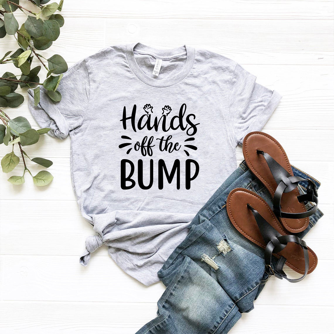 DT0643 Hands Off The Bump unisex T-shirt in various colors, showcasing its soft fabric and stylish design.