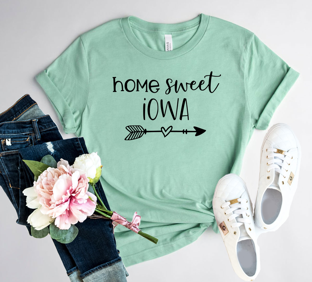 DT0077 Home Sweet Iowa unisex T-shirt in various colors, showcasing its soft fabric and stylish design.