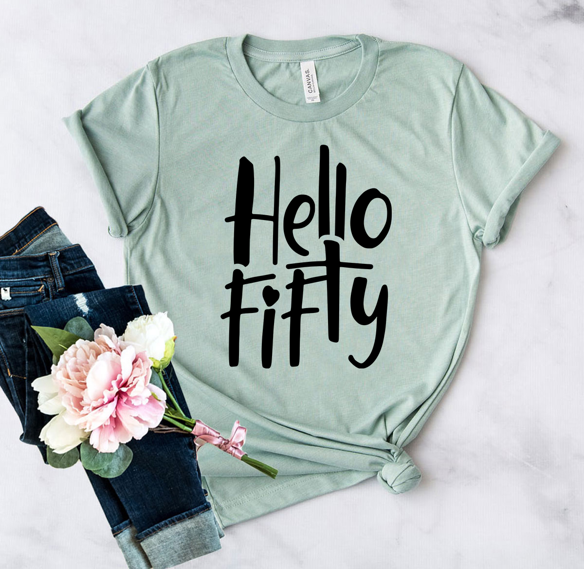 DT0821 Hello Fifty Shirt in various colors, showcasing its unisex design and soft fabric.