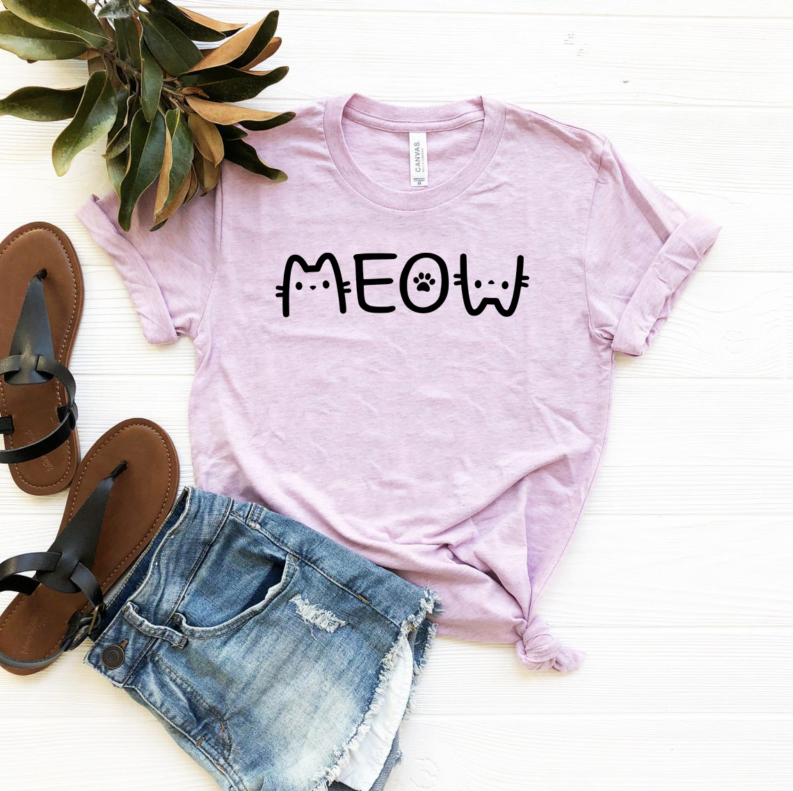 DT0992 Meow Shirt in various colors, showcasing its soft fabric and stylish design.