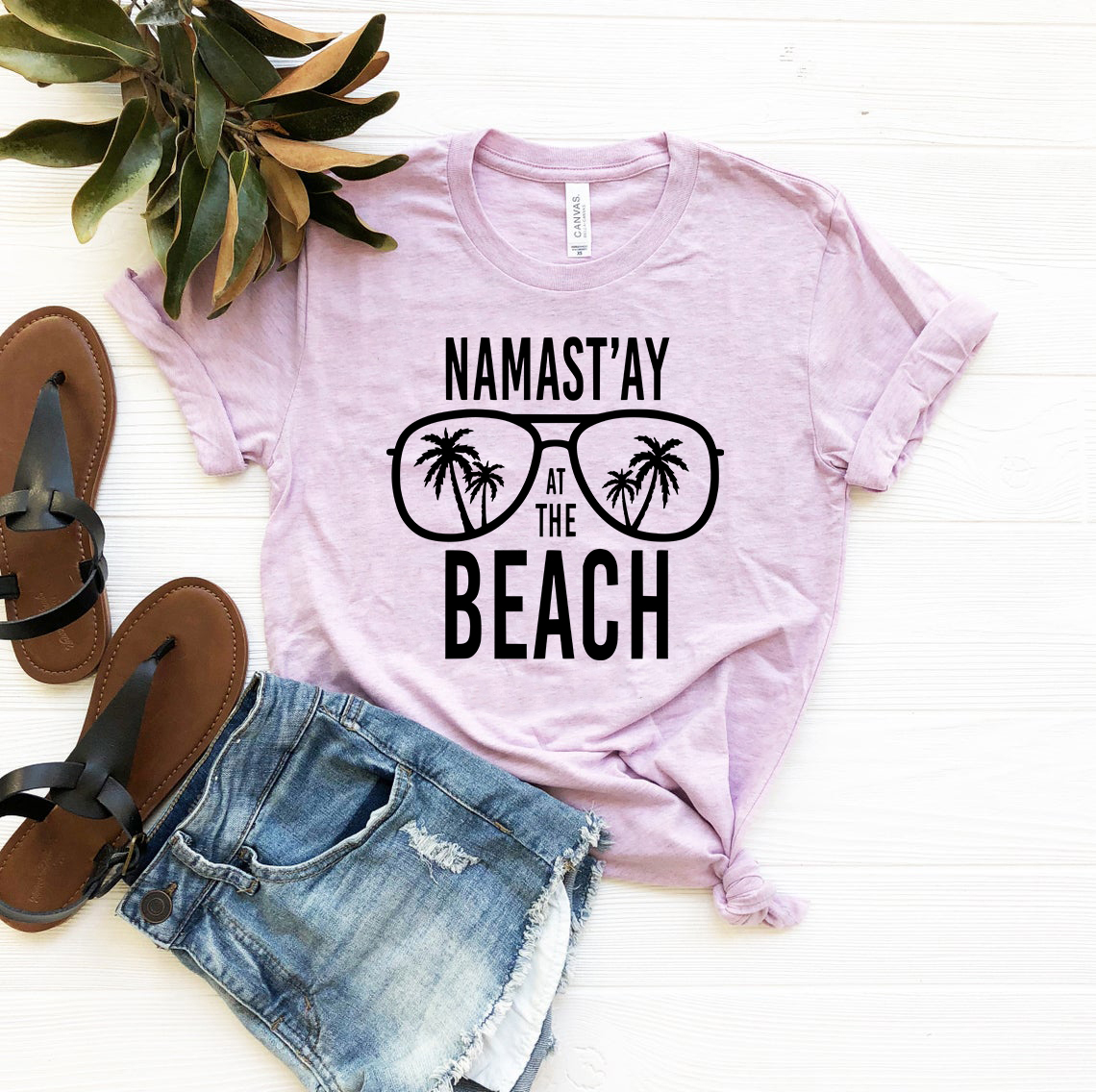 DT0975 Namastay At The Beach Shirt in various colors, showcasing its comfortable fabric and stylish design.