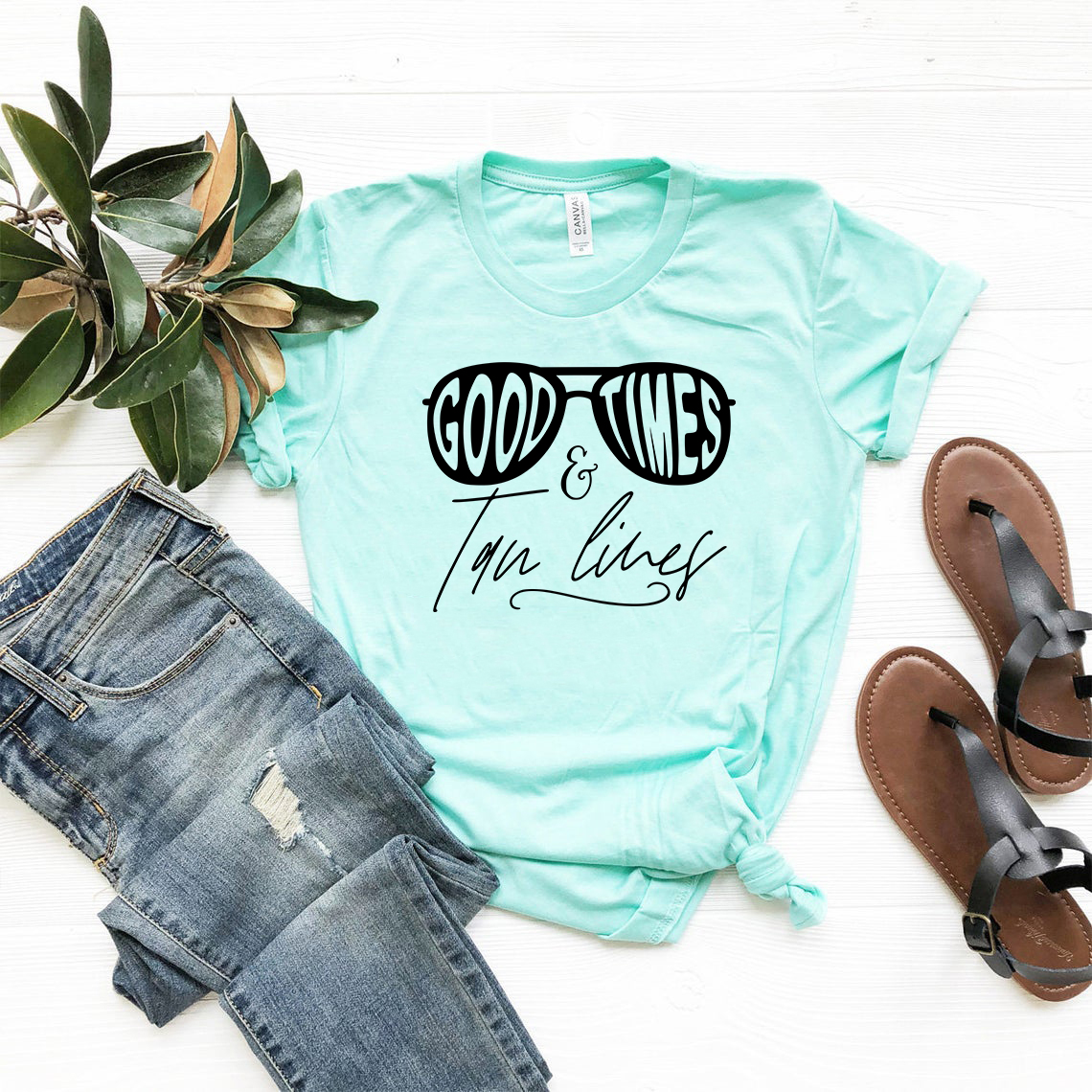 DT0988 Good Times and Tan Lines unisex T-shirt in various colors, showcasing its soft fabric and stylish design.