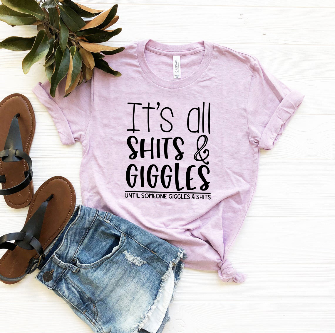 DT0980 Its All Shits And Giggles Shirt displayed in multiple colors, showcasing its comfortable fit and humorous design.