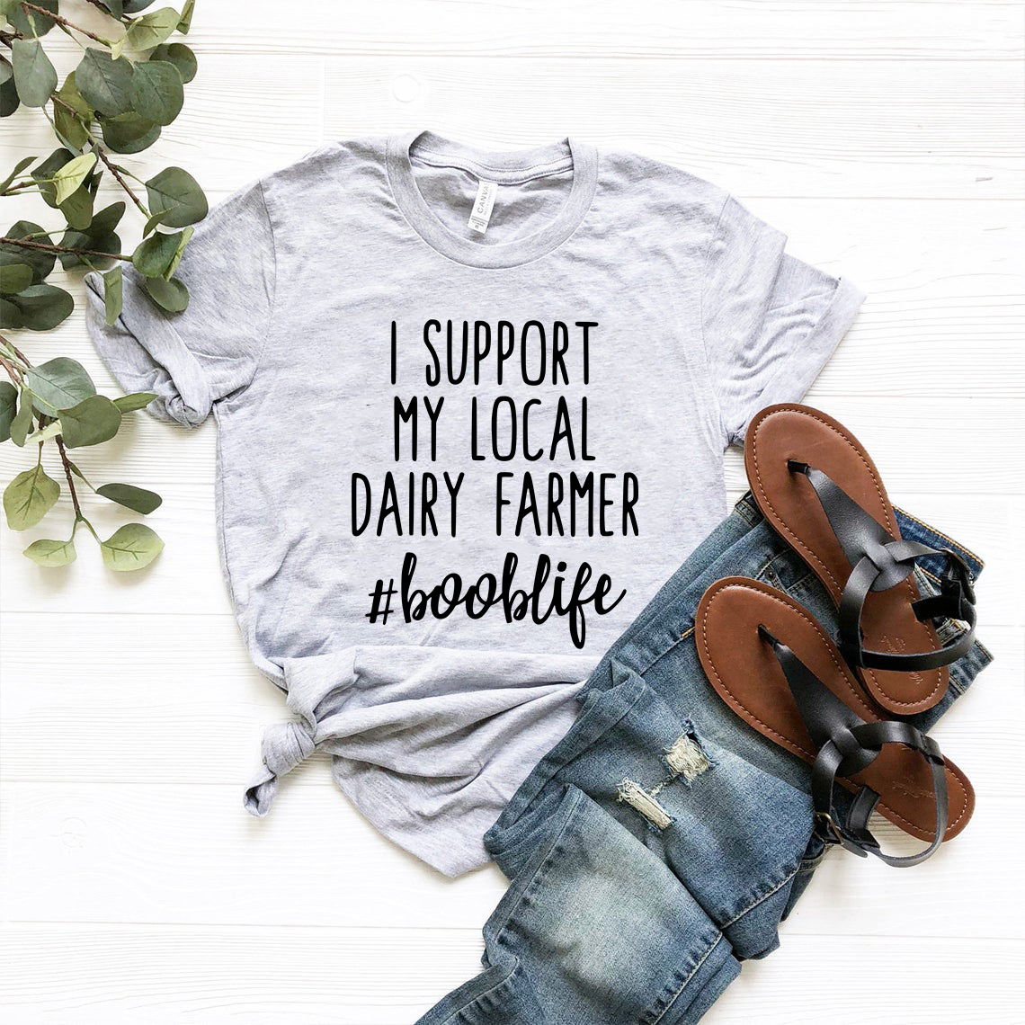 DT1000 Unisex T-shirt in various colors, featuring a supportive message for local dairy farmers, made from soft ring spun cotton.