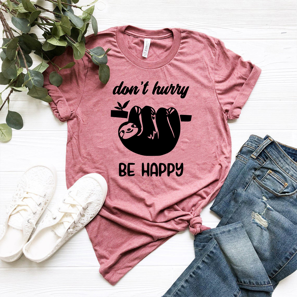 DT1025 Don't Hurry Be Happy unisex T-shirt in various colors, showcasing its soft fabric and stylish design.