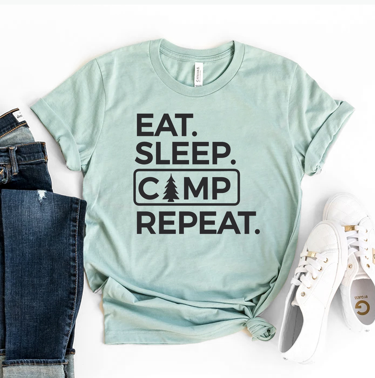 Eat Sleep Camp Repeat T-shirt made of premium ring spun cotton, featuring a vibrant flex print design, available in various sizes.