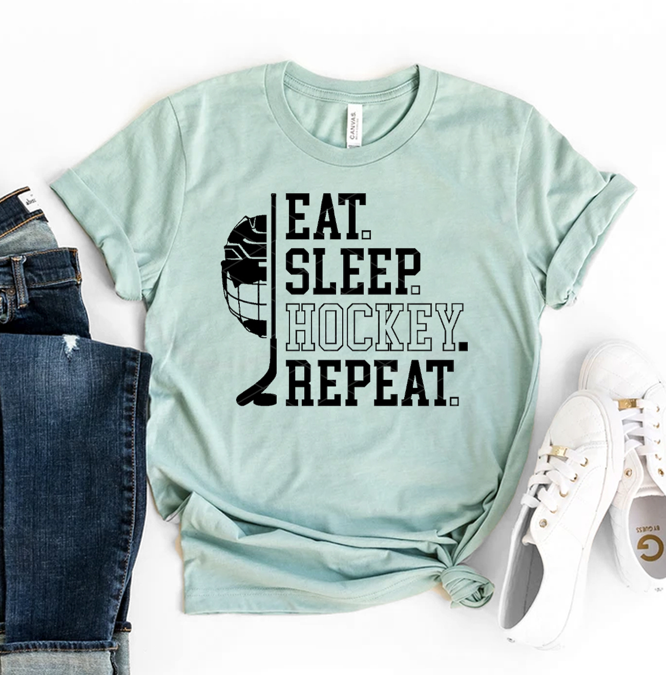 Eat Sleep Hockey Repeat T-shirt made of premium ring spun cotton, featuring a vibrant flex print design, available in multiple sizes.