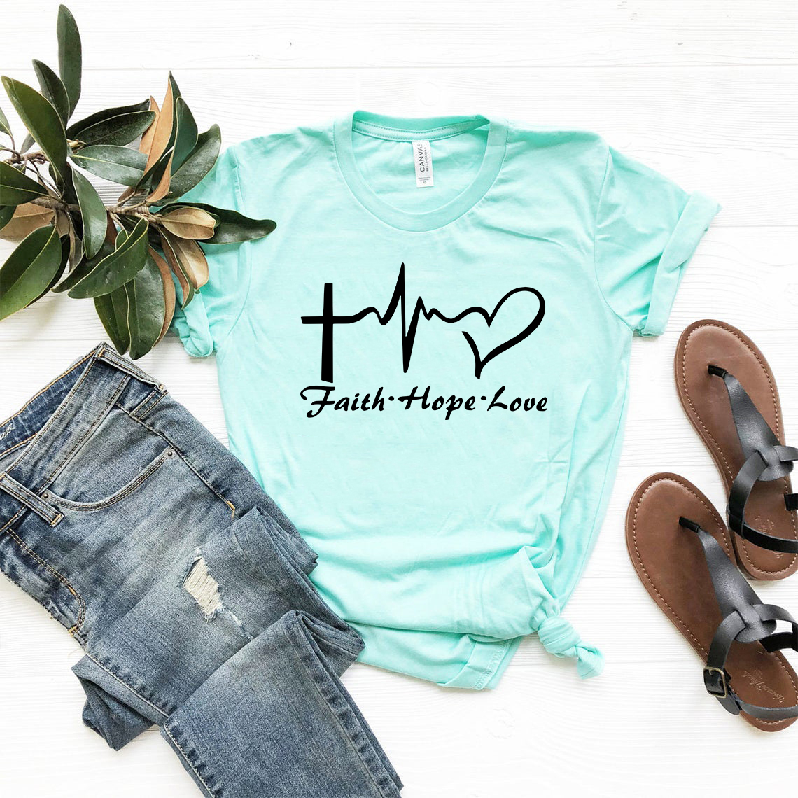 A unisex Faith Hope Love Shirt made from soft ring spun cotton, featuring a crew neck and available in multiple colors.