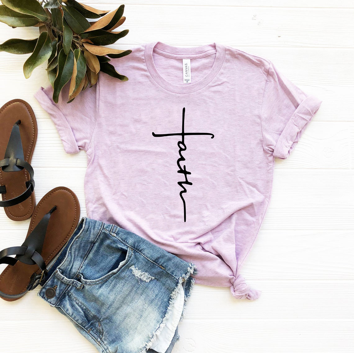 A stylish unisex Faith Shirt made from soft ring spun cotton, available in multiple colors and sizes, featuring a crew neck and short sleeves.