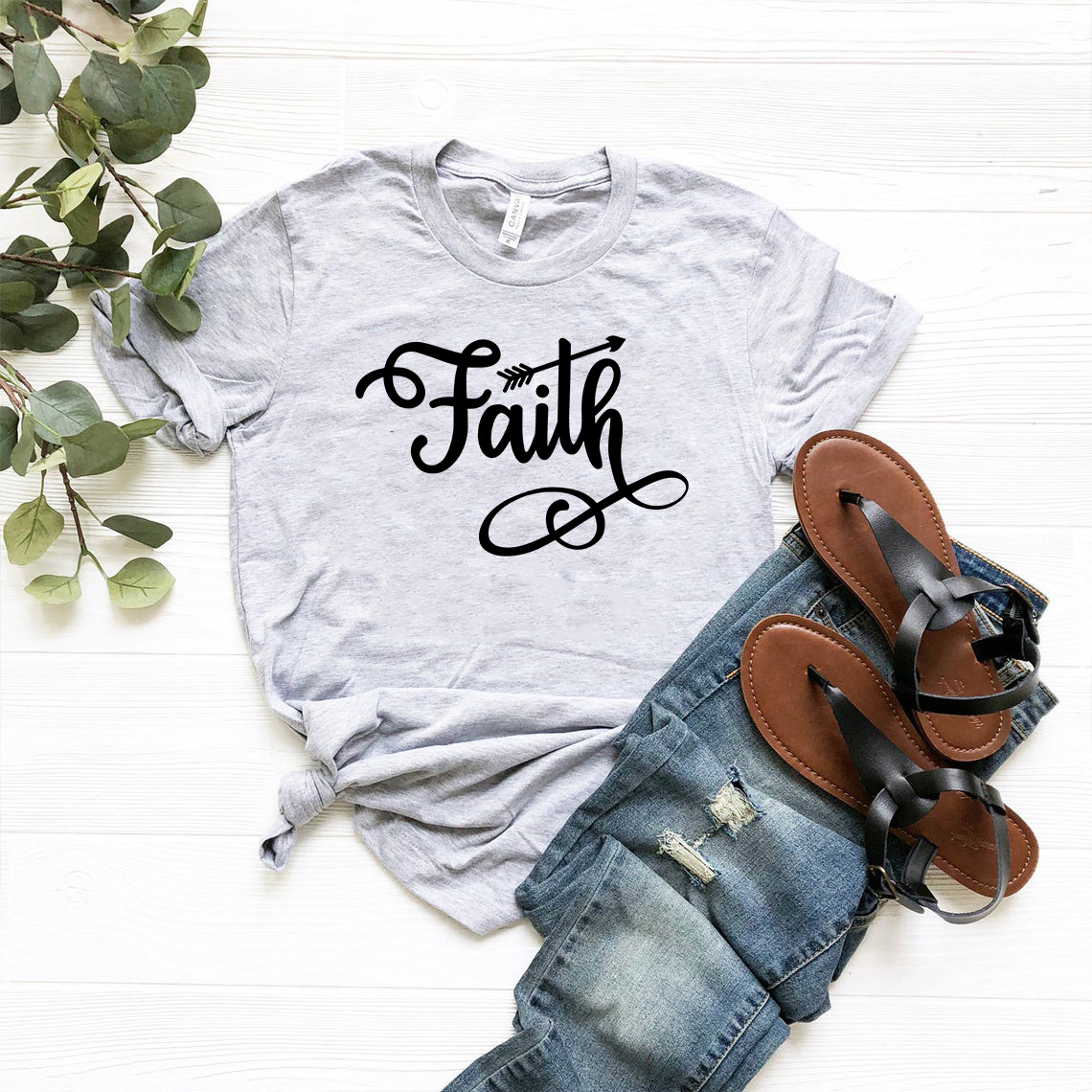 Faith Unisex T-shirt in various colors, showcasing its soft fabric and stylish design.